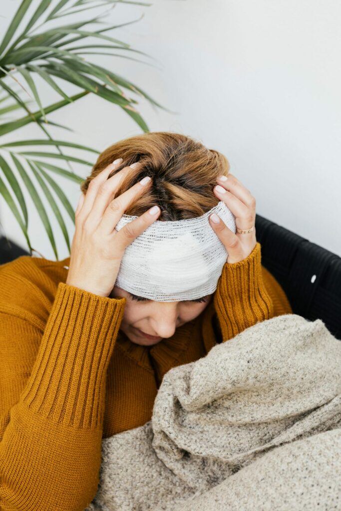 A Woman with a Bandage on Her Head